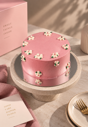 Pink Cake With Flowers Design