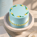 Baby Blue Cake With Flowers Design