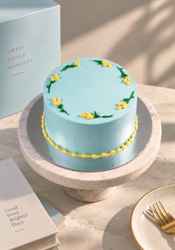 Baby Blue Cake With Flowers Design